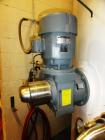 Used 10,000 Gallon Mixing Tank with Vent on Top Dish. Top and bottom electrically heated (previously used for liquid sugar).  Bottom side manway, bottom side agitator 6.25hp, Reuland motor. 11'-6