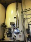 Used 10,000 DCI Gallon Mixing Tank with Vent on Top. Dish top and bottom electrically heated (previously used for liquid sugar). Bottom side manway, bottom side agitator 6.25hp Reuland motor. 11'-6