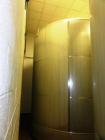 Used- 10,000 Gallon Vertical, Stainless Steel. Domed top, sloped bottom mixing tank with vent on top, bottom side manway. Bo...