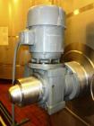 Used 10,000 Gallon Vertical, Stainless Steel. Domed top, sloped bottom mixing tank with vent on top, bottom side manway. Bottom side 6.25hp agitator with 155 final rpm mixer. 12