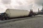 USED: DCI 30,000 gallon, stainless steel, vertical tank. 12' inside diameter x 36' straight side. 304 stainless steel, insulated, jacketed. 7.5/3.75 hp, 3/60/460V gear motor, 54/27 rpm, with 46