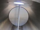 Used Dairy Craft Tank, 5000 Gallon, 316 Stainless Steel, Horizontal. Approximately 84” diameter x 209” straight side, dished heads. UL Rated for above ground flammable storage, UL #123061. Top mounte...