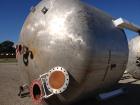 Used Enerfab Inc Vertical Tank, Approximately 7000 Gallons, Stainless Steel. Approximately 12 foot diameter x 6 foot straight side.  Dished heads. Internal rated 125 PSI at 100 Degrees F.  4 Steel le...