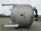 Used Enerfab Inc Vertical Tank. Approximately 7000 gallons, stainless steel. Approximately 12 ft diameter x 6 ft straight side.  Dished heads . Internal rated 125 psi @ 100 deg F.  4  Steel leg mount...