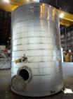 Used Evans & Sons Tank, 9000 Gallon, 316 Stainless Steel, Vertical. Approximate 126” diameter x 168” straight side, flat top and bottom. Internal atmospheric at 150 degrees F. Openings top 2”, (4) 4”...