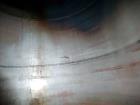 Used Evans & Sons Tank, 9000 Gallon, 316 Stainless Steel, Vertical. Approximate 126” diameter x 168” straight side, flat top and bottom. Internal atmospheric at 150 degrees F. Openings top 2”, (4) 4”...