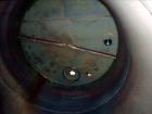 Used Evans & Sons Tank, 9000 Gallon, 316 Stainless Steel, Vertical. Approximate 126” diameter x 168” straight side, flat top and bottom. Internal atmospheric at 150 degrees F. Openings top 2”, (4) 4”...