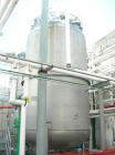 USED: Fabricated Products tank, 9000 gallon, 316L stainless steel, vertical. Approximately 10' diameter x 14' straight side, 2:1 elliptical top and bottom. Internal rated FV and 15 psi at 200 deg F. ...