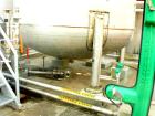 USED: Fabricated Products tank, 9000 gallon, 316L stainless steel, vertical. Approximately 10' diameter x 14' straight side, 2:1 elliptical top and bottom. Internal rated FV and 15 psi at 200 deg F. ...