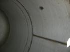 USED: Fabricated Products tank, 9000 gallon, 316L stainless steel, vertical. Approximately 10' diameter x 14' straight side, 2:1 elliptical top and bottom. Internal rated FV and 15 psi at 200 deg F. ...