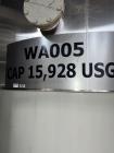 Used Approximately 15,000 Gallon Feldmeier Stainless Steel Tank. 144