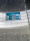 Used Approximately 15,000 Gallon Feldmeier Stainless Steel Tank. 144