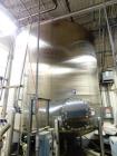 Used- Feldmeier 9,000 Gallon Vertical Storage Tank, Stainless Steel. Dish top and dish bottom with center 6