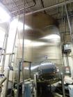 Used Feldmeier 9,000 Gallon Vertical Storage Tank, Stainless Steel. Dish top and dish bottom with center 6
