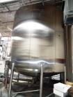 Used Feldmeier 9,000 Gallon Vertical Storage Tank, Stainless Steel. Dish top and dish bottom with center 6