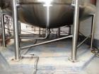 Used Feldmeier 9,000 Gallon Vertical Storage Tank, Stainless Steel. Dish top and dish bottom with center 6