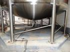 Used- Feldmeier 9,000 Gallon Vertical Storage Tank, Stainless Steel. Dish top and dish bottom with center 6