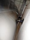 Used Feldmeier 9,000 Gallon Vertical Storage Tank, Stainless Steel. Dish top and dish bottom with center 6