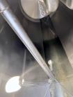 Used Feldmeier Single Wall Tank, 6,000 Gallon, 304 Stainless Steel, Vertical.  Approximate 90