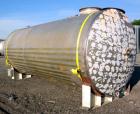 Used Hamilton Welding Company Tank, 5,200 Gallon, 304 Stainless Steel, Horizontal. Approximately 84” diameter x 202” straight side, dished heads. Openings: top 24” manway with cover, 3” side bottom o...