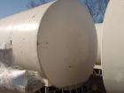 USED: 8,500 gallon Heil insulated horizontal storage tank. 304stainless steel interior, mild steel painted exterior, verticalagitator, 9'9