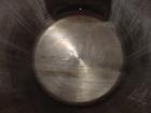 USED: 8,500 gallon Heil insulated horizontal storage tank. 304stainless steel interior, mild steel painted exterior, verticalagitator, 9'9