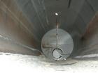 Used Industrial Air Tank, 10,000 Gallon, 304 Stainless Steel, Horizontal, Insulated. Approximately 8' diameter x 28' long, appears to be flat ends. Openings: top (2) 3'', 4'', 30'' manway with cover,...
