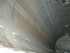 Used Industrial Air Tank, 10,000 Gallon, 304 Stainless Steel, Horizontal, Insulated. Approximately 8' diameter x 28' long, appears to be flat ends. Openings: top (2) 3'', 4'', 30'' manway with cover,...