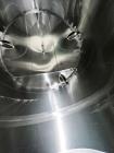 Used JV Northwest 10,000 Gallon Stainless Steel Tank with cone bottom. Vessel measures 12' diameter x 11-1/2 straight side with cone bottom leading to 4