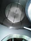Used JV Northwest 10,000 Gallon Stainless Steel Tank with cone bottom. Vessel measures 12' diameter x 11-1/2 straight side with cone bottom leading to 4