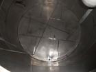 Used Krenz Approximately 10,000 Gallon Stainless Steel Storage Tank. Approximately 12' diameter x 12' straight side. Flat bottom and slight cone top. Various top openings including a 17