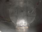 Used Krenz Approximately 10,000 Gallon Stainless Steel Storage Tank. Approximately 12' diameter x 12' straight side. Flat bottom and slight cone top. Various top openings including a 17