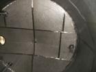 Used Krenz Approximately 10,000 Gallon Stainless Steel Storage Tank. Approximately 12' diameter x 12' straight side. Flat bottom and slight cone top. Various top openings including a 17