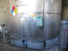 Used Krenz Approximately 10,000 Gallon Stainless Steel Storage Tank. Approximately 12' diameter x 12' straight side. Flat bottom and slight cone top. Various top openings including a 17