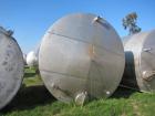 Used Krenz Approximately 8,500 Gallon Stainless Steel Storage Tank. Approximately 11' diameter x 12' straight side. Flat bottom and slight cone top. Various top openings including a 17