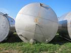 Used Krenz Approximately 8,500 Gallon Stainless Steel Storage Tank. Approximately 11' diameter x 12' straight side. Flat bottom and slight cone top. Various top openings including a 17