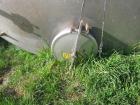 Used Krenz Approximately 8,500 Gallon Stainless Steel Storage Tank. Approximately 11' diameter x 12' straight side. Flat bottom and slight cone top. Various top openings including a 17