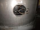 Used Krenz Approximately 8,500 Gallon Stainless Steel Storage Tank. Approximately 11' diameter x 12' straight side. Flat bottom and slight cone top. Various top openings including a 17