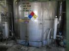 Used Krenz Approximately 8,500 Gallon Stainless Steel Storage Tank. Approximately 11' diameter x 12' straight side. Flat bottom and slight cone top. Various top openings including a 17