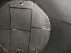 Used Krenz Approximately 8,500 Gallon Stainless Steel Storage Tank. Approximately 11' diameter x 12' straight side. Flat bottom and slight cone top. Various top openings including a 17
