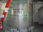 Used- Krenz Approximately 10,000 Gallon Stainless Steel Storage Tank. Approximately 12' diameter x 12' straight side. Flat b...