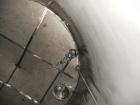Used Krenz Approximately 10,000 Gallon Stainless Steel Storage Tank. Approximately 12' diameter x 12' straight side. Flat bottom and slight cone top. Various top openings including a 17