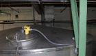 Used Krenz Approximately 10,000 Gallon Stainless Steel Storage Tank. Approximately 12' diameter x 12' straight side. Flat bottom and slight cone top. Various top openings including a 17