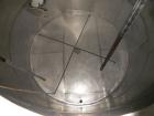 Used Krenz Approximately 7,800 Gallon Stainless Steel Storage Tank. Approximately 11' diameter x 11' straight side. Flat bottom and slight cone top. Various top openings including a 17