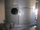 Used Krenz Approximately 7,800 Gallon Stainless Steel Storage Tank. Approximately 11' diameter x 11' straight side. Flat bottom and slight cone top. Various top openings including a 17