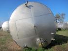 Used Saracco Tank & Mfg Approximately 8,500 Gallon Stainless Steel Storage Tank. Approximately 11' diameter x 12' straight side. Flat bottom and slight cone top. Various top openings including a 17