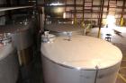 Used- Mueller Tank, 6000 Gallon, Model DF, 304 Stainless Steel, Vertical. Approximate 118