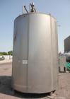 Used Mueller Storage Tank, 6,000 Gallon, Model D, 304 Stainless Steel, Vertical. 112” Diameter x approximate 135” straight side, dished top, 5” pitched sloped bottom. sidewall dimple jacket, approxim...