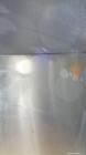 Used Mueller Storage Tank, 6,000 Gallon, Model D, 304 Stainless Steel, Vertical. 112” Diameter x approximate 135” straight side, dished top, 5” pitched sloped bottom. sidewall dimple jacket, approxim...