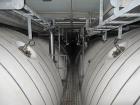 Used Mueller Tank, 45,000 Gallon, Model H, Stainless Steel, Horizontal. Approximate 148-1/2” diameter x 564” straight side, dished heads. Internal rated 9 psi at 32 to 300 degrees F. 304 Stainless st...